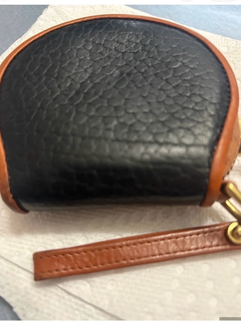 Dooney & Bourke Embossed Round Leather Wristlet in Cognac